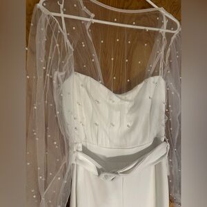 Lulu’s white pant suit with sheer, beaded top. 
Size M